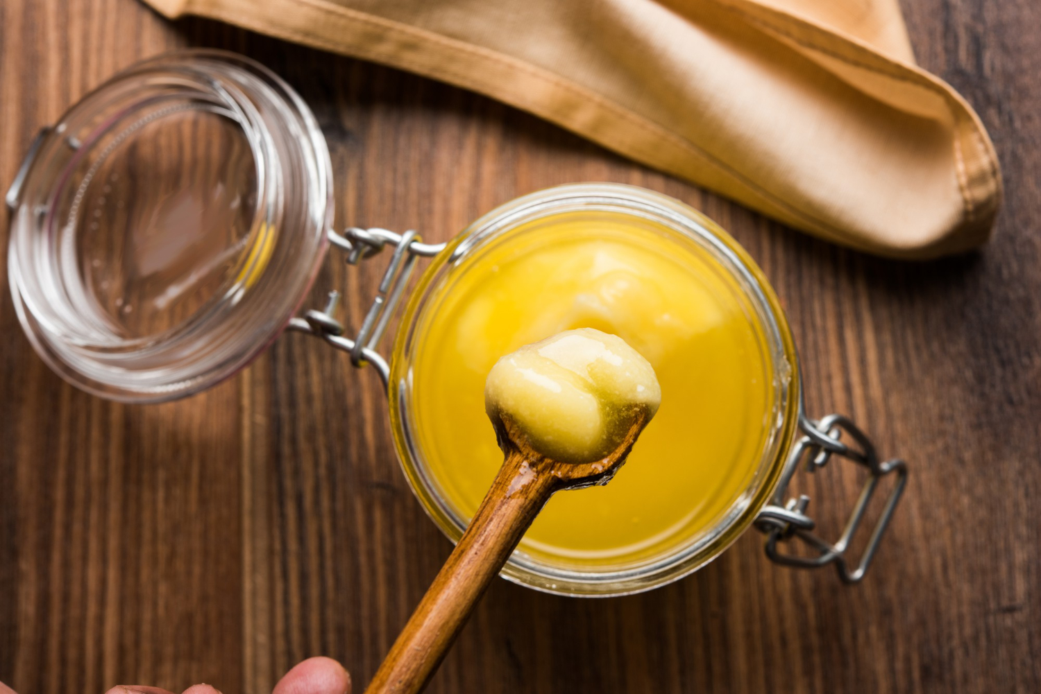 Close-up of pure ghee in a glass jar
